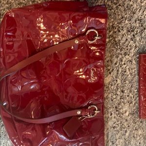 Coach dark red shinny purse